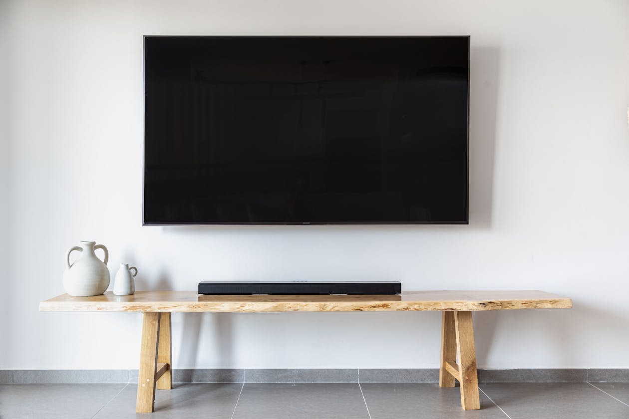 apollo group tv pricing - modern wall-mounted smart TV setup