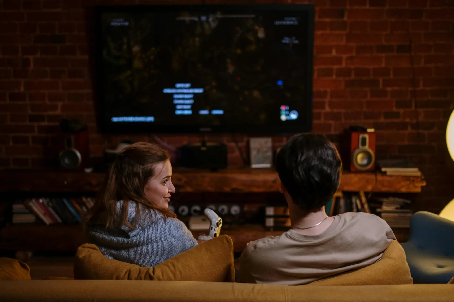 Couple watching Apollo Group TV IPTV on a Smart TV